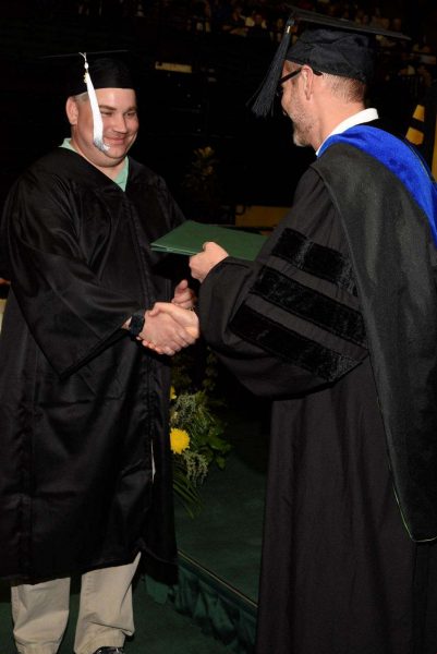 Nielsen with Matt MacKenzie, earning philosophy degree