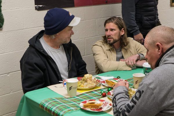 Seth Forwood with guests at Fort Collins Rescue Mission