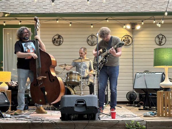 Collin playing with his band